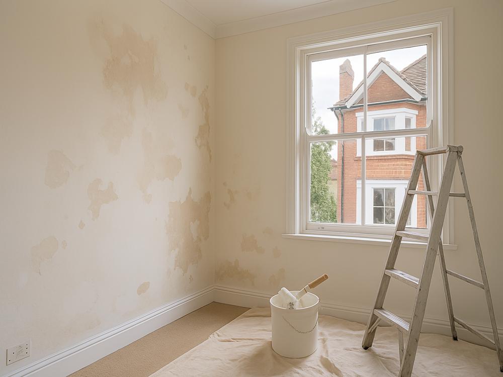Interior property refresh work in Blackburn showing wall preparation and decorating