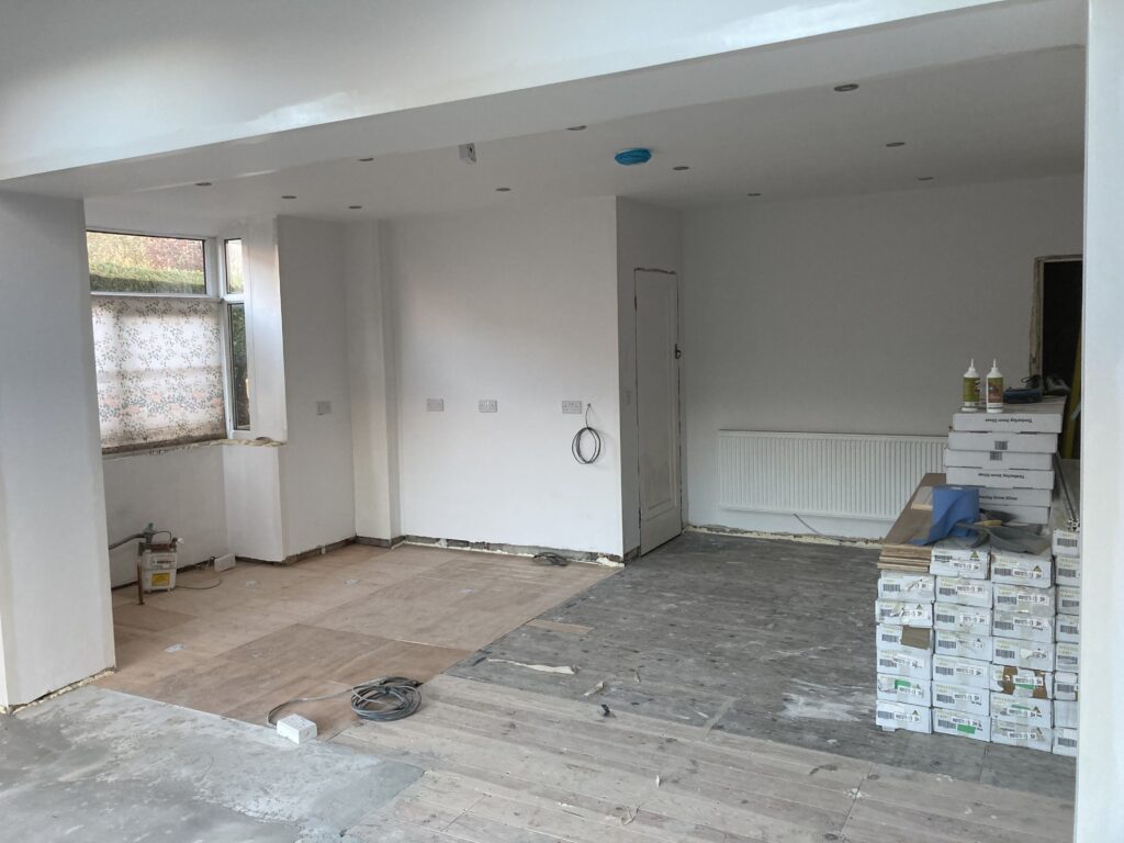 Kitchen stripped back to bare walls and subfloor before renovation, Blackburn